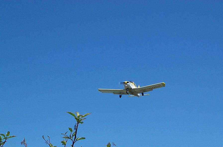 Piper Cherokee GODP on short final approach onto Runway 19 at Langley Airport. Langley Flying School.